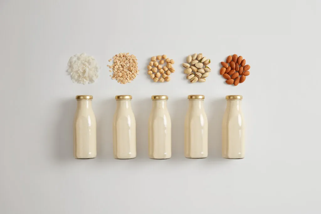 vegetable white milk made cocnut oat hazelnut pistachio almond ingredients preparing vegetarian beverage product contains good amount protein vitamin d calcium healthy drink