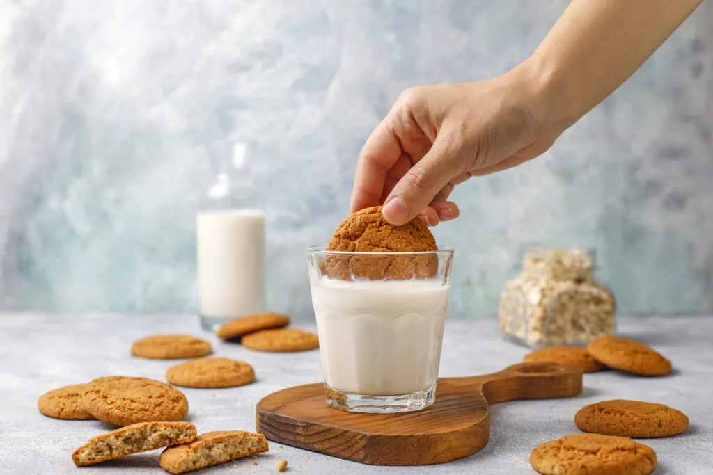 homemade oatmeal cookies with cup milk