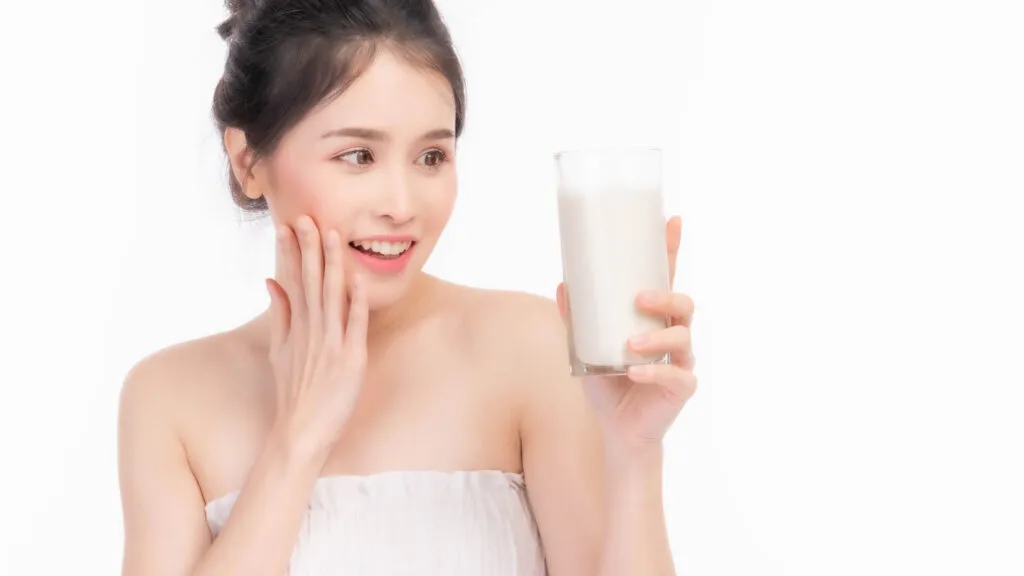 beauty woman asian cute girl feel happy drinking milk good health morning white background lifestyle beauty woman concept