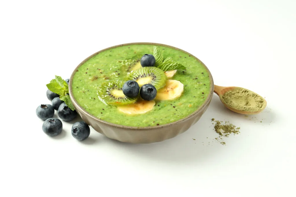 smoothie with different ingredients white background