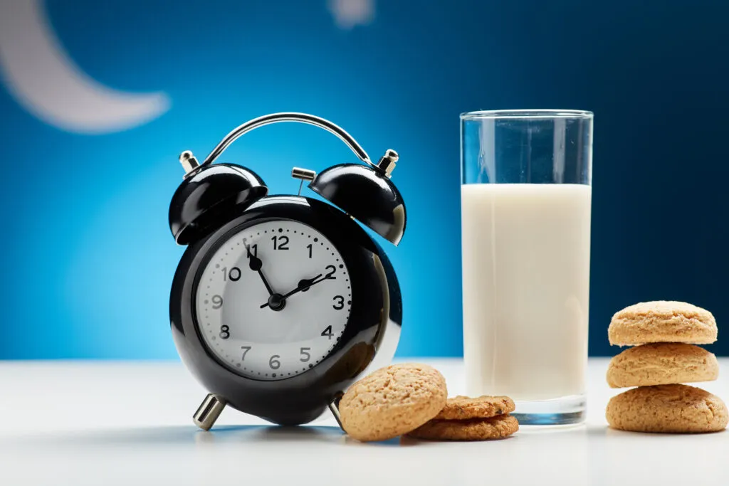 glass milk cookies alarm clock night