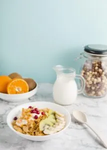 high angle cornflakes with yogurt fruits