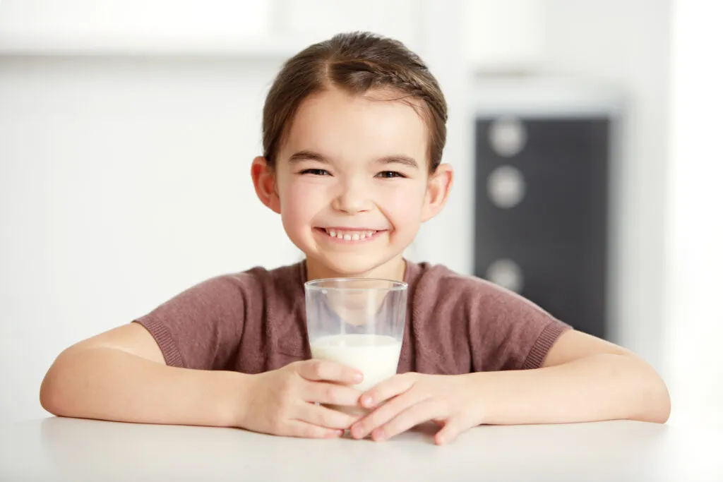 healthy bones happy kids portrait cute little girl enjoying glass milk
